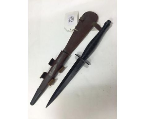A SECOND WORLD WAR COMMANDO DAGGER in leather scabbard, 12.5"