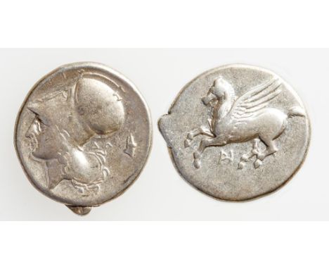 GREEK, AKARNANIA, CORINTH. AR STATER, EARLY TO MID FOURTH CENTURY B.C. Pegasus flying left, head of Athena wearing a Corinthi