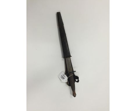 A SECOND WORLD WAR COMMANDO DAGGER in leather scabbard, 12"