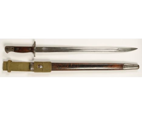 AN ENFIELD BAYONET with leather scabbard and canvas frog, 23"