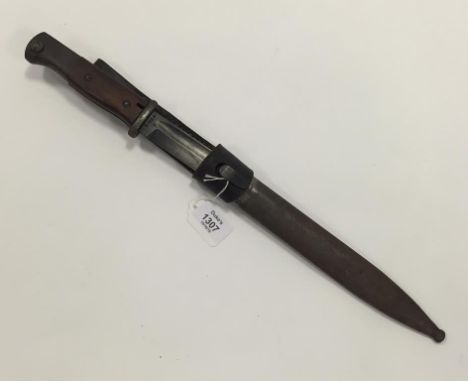 A GERMAN BAYONET with scabbard and leather frog, 16"