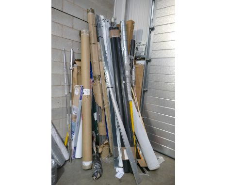A large mixed collection of lengthy items to include various metal, plastic and rubber pipping and rails, chicken fences, woo