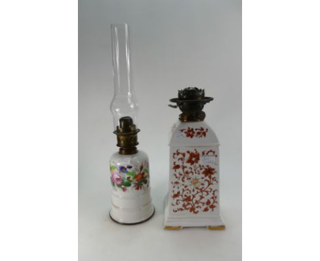 A continental unmarked ceramic lamp base with Hinks's number 2 duplex burner and similar hand decorated oil lamp (2)
