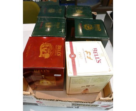 A collection of Wade Bells Scotch Whisky sealed decanters to include - Christmas decanters for 1992, 1993, 1994 and 1995 toge