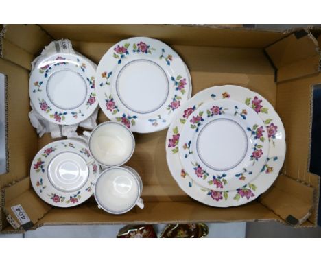 A collection of Wedgwood Chinese flowered dinner ware to include cups, saucers, dinner plates, etc. 