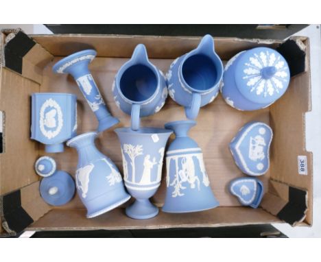 A collection of Wedgwood Jasper ware items to include trinket boxes, vases, candlesticks, jugs, tobacco jar, etc. 