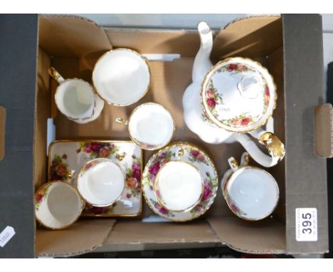 A collection of Royal Albert Old Country Rose items to include small coffee pot, coffee cups, saucers, pin trays, etc.