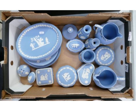 A collection of Wedgwood Jasper Ware items to include trinket boxes, sweet boxes, commemorative wall plates, jugs, powder tra