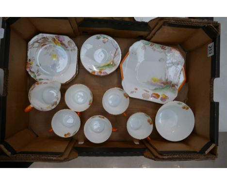 A collection of Shelley art deco hand painted tea ware in the W.S.068 design to include cups, saucers, sandwich plates, side 