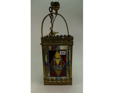 Victorian Gothic Brass and Leaded glass hall lantern,glass panels complete but mishaped within frame 