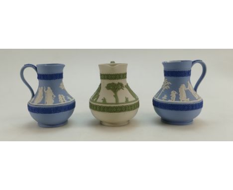 Wedgwood tri colour Jasper ware jugs together with similar ware item in sage green on cream. (3)