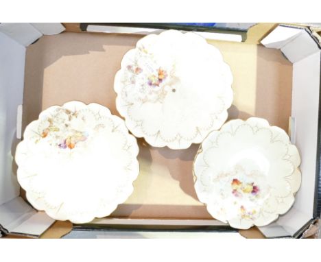 A collection of Royal Worcester dinner ware with foliage and spider decoration to include plates and comports. (9)
