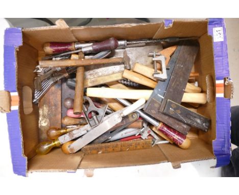 A mixed collection of vintage tools to include set squares, rulers, screwdriver sets, spanner sets, screwdrivers etc. 