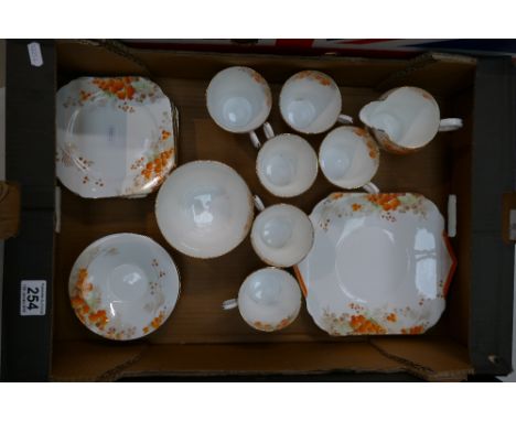 A collection of Shelley art deco hand painted tea ware in the CS 0238 design to include cups, saucers, sandwich plates, side 