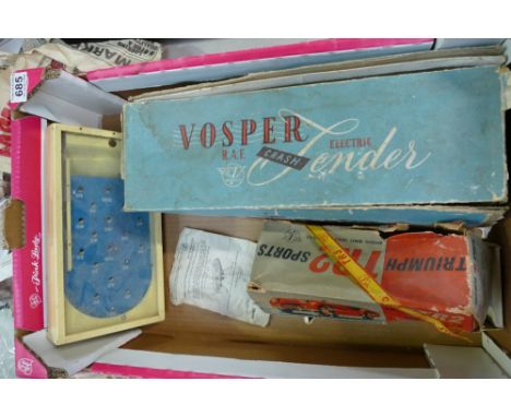 A collection of early boxed toys to include - Victor branded Triumph TR2 sports car, CV models Vospa electric boat and a Chad