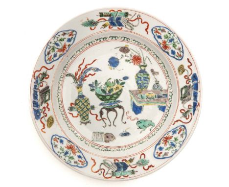 Decorated with Chinese Antiquities, marked with double ring and censer, 23 cm. in diameter, hairline.
