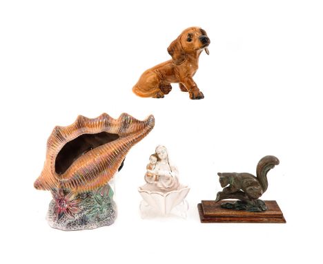 consisting of 4 pieces of earthenware, including a dog, marked Goebel, height 14 cm.