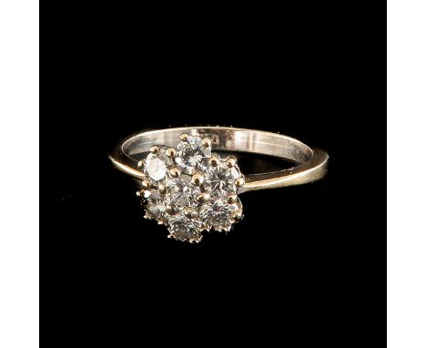 Set with 7 brilliant cut diamonds 0.35 Ct in total. ring size 16