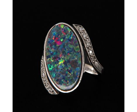 18KG set with opal and 10 diamonds ring size 17