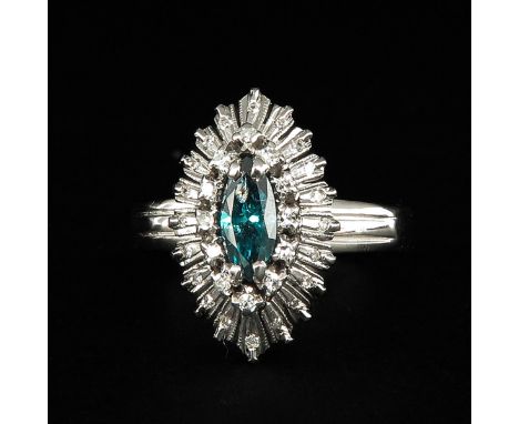 Set with many diamonds including a marquise cut blue diamond 4 x 9 mm approx. 0.5 Ct. ring size 20