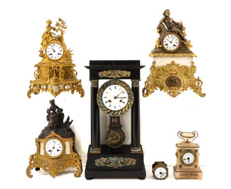 consisting of 6 clocks, including mantel clock, signed C. Detouche, highest 56 cm.