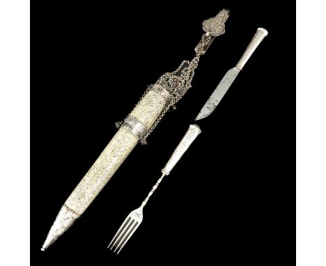 Covered with ray skin and silver fittings containing an 18th century knife and 18th century fork with silver handles unclearl