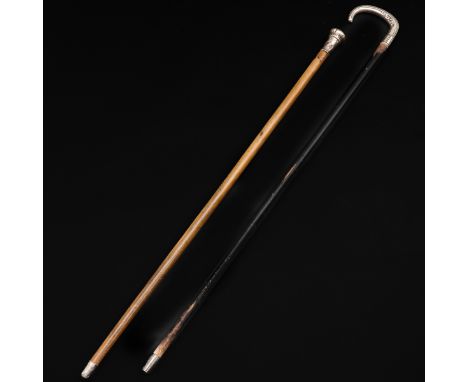 Consisting of 2 walking sticks including with silver handle length 83 cm.