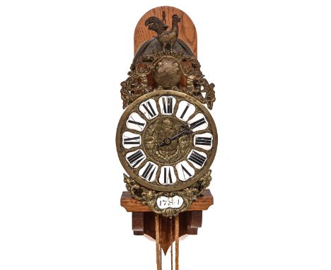 France, dated 1781, with enameled figures and on a wooden bracket, clock height 34 cm.