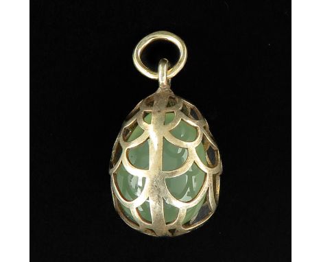 marked 88 containing a jade pearl pendant length 30 mm.