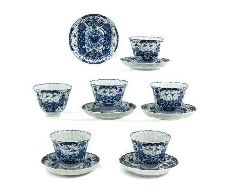 Decorated with flowers and phoenix and flowers, saucers are 13 cm. in diameter, chip and hairline.