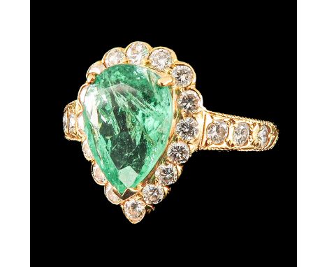 Set with emerald 2 Ct. surrounded by 16 diamonds ring size 16