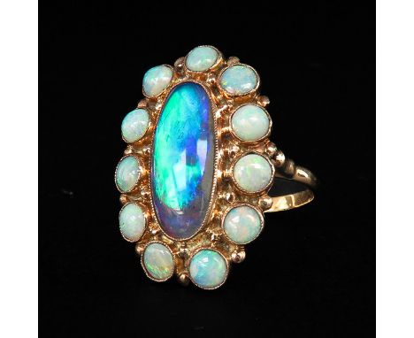 Set with 12 opals largest 6 x 14 mm ring size 17