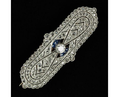 silver on gold set with sapphire and diamond largest diameter 3.3 mm length 44 mm.