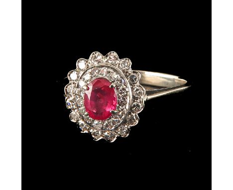 Set with many diamonds and ruby 4 x 5 mm ring size 19