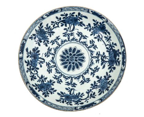 Floral decor, 18th Century, marked with double ring and artemisia leaf, 39 cm. in diameter, chip.
