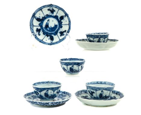 Including 4 cups and 4 saucers, depicting Chinese figures in garden, largest saucer is 12 cm. in diameter, chip and hairline.