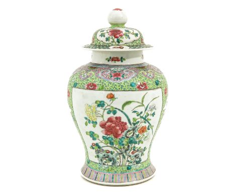 Light green ground decorated with floral cartouches, 19th Century, 41 cm. tall.
