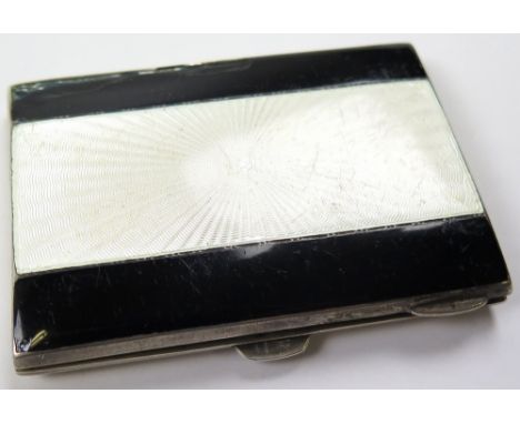 Silver cigarette case with a black & white enamelled lid (some damage to enamel), hallmarked Birmingham 1935 by Turner & Simp