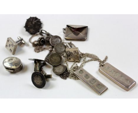 Silver items (11), including 2 pairs of cufflinks, a patch box, 2 ingots, a coin bracelet, a Victorian brooch, a stamp envelo