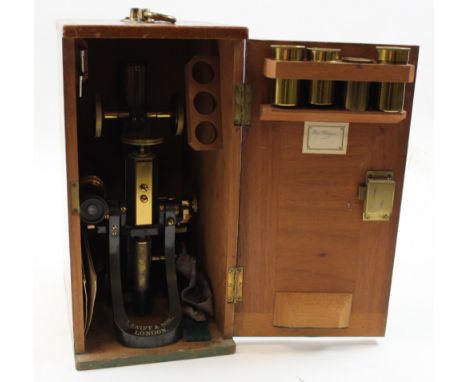 Microscope with brass fittings by J. Swift & Son, London, with a selection of lenses, contained in original box
