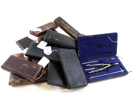 Sixteen compass sets, all in original leather boxes