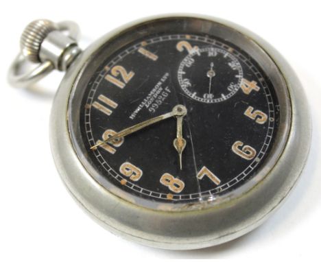 Military issue open face pocket watch by H Williamson London, the black face with arabic numerals surrounded by a minute trac