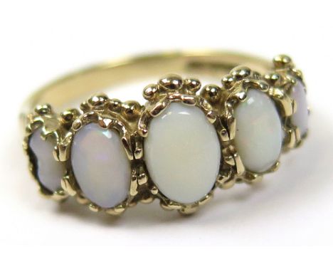 9ct Ring set with 5 Opals size R weight 3.9 grams
