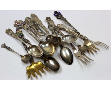 Eleven silver teaspoons and 4 silver forks. American, Canadian and British. Total wt. - 7oz (including a loaded fork).
