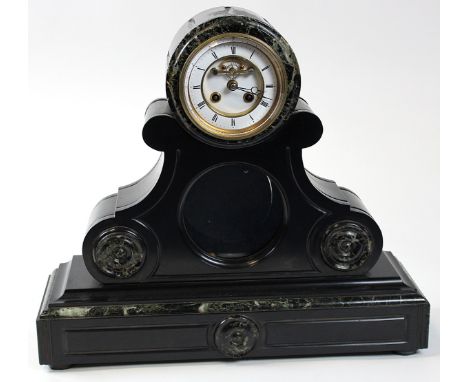 Black slate mantle clock with marble motifs.