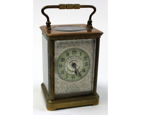Five glass brass carriage clock, the dial in green with black Arabic numerals surrounded by an ornate silver front, approx he