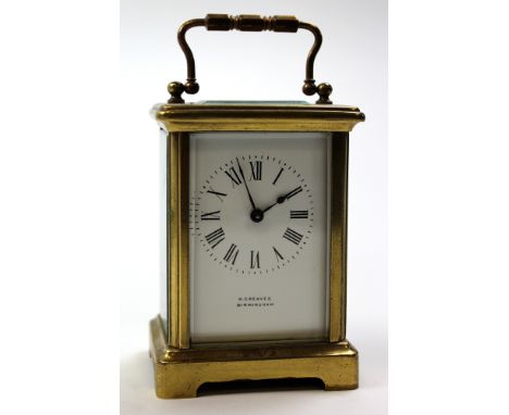 Five glass brass carriage clock by H Greaves Birmingham the white face with black Roman numerals, approx height not including