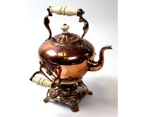 A Victorian Copper Kettle on stand with burner, ceramic handles and ornate scrolled decoration. Standing 37 cm high. 