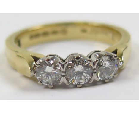 18ct 3 stone Diamond Ring approx. 1.00ct weight size V weight 9.2 grams 