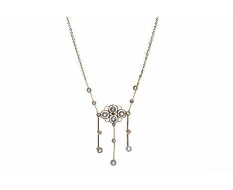 EDWARDIAN AQUAMARINE AND SPLIT PEARL NECKLETthe central openwork quatrefoil section set with round aquamarines with three fri
